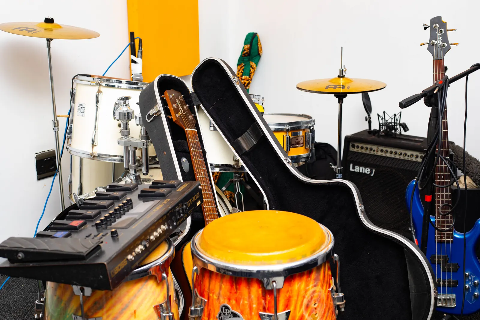 Live room with drums, bass, guitars, and percussion for worship and choir sessions.