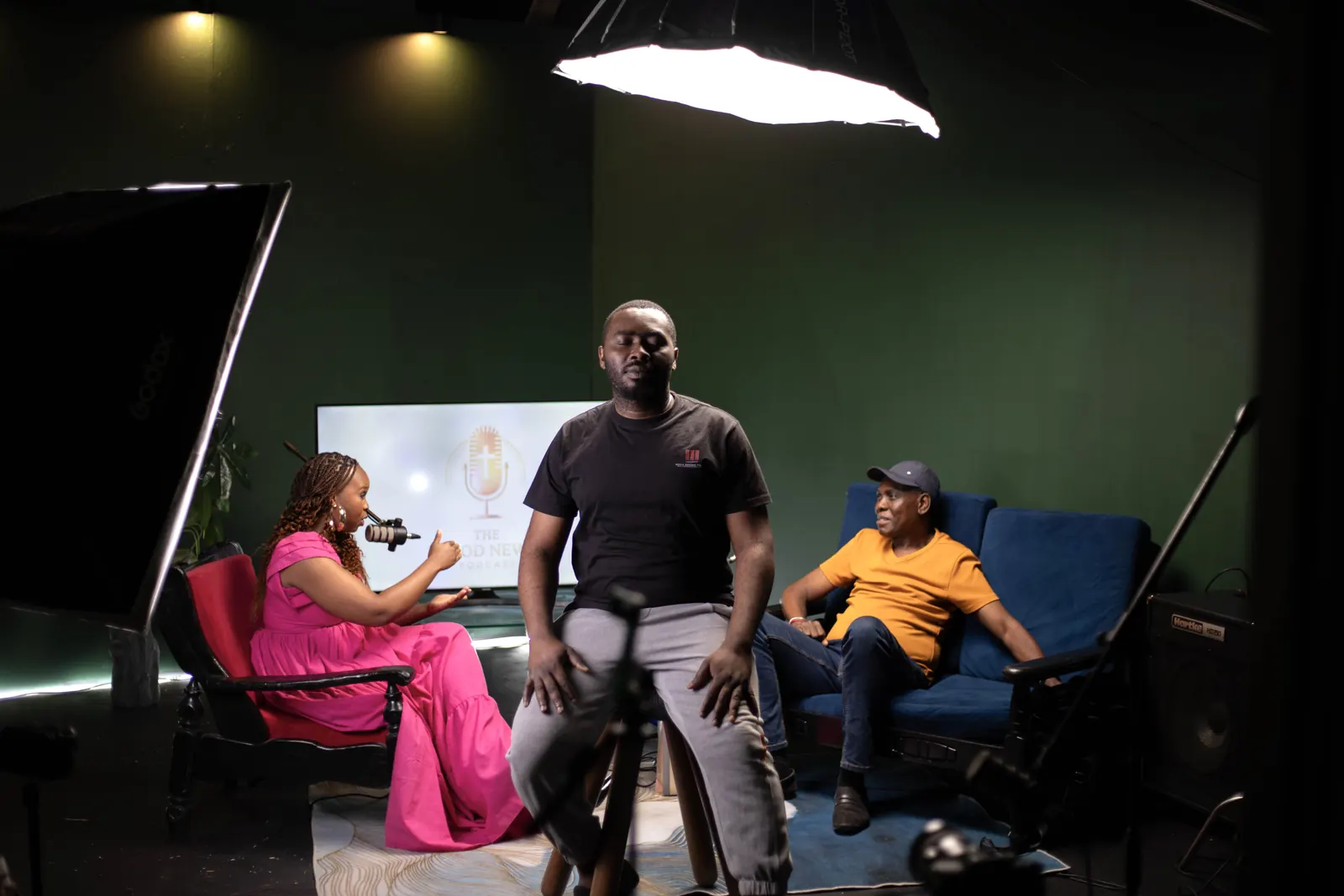 A ministry conversation being filmed on the SN7 studio set with lights and cameras.